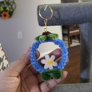 Blue and Green Crochet Keychain with Daisy